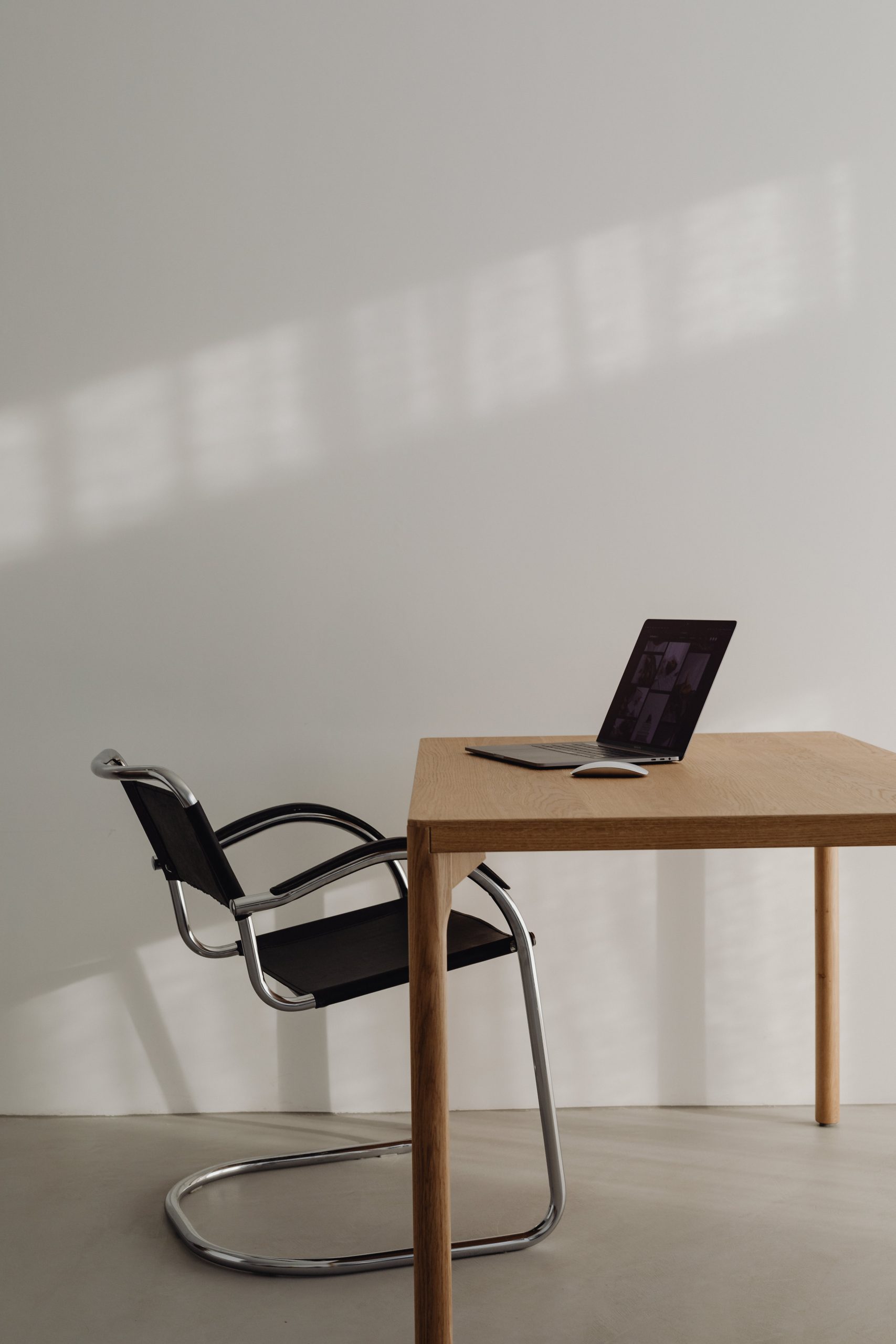 Computer and chair ready for an SEO Website auditing session.
